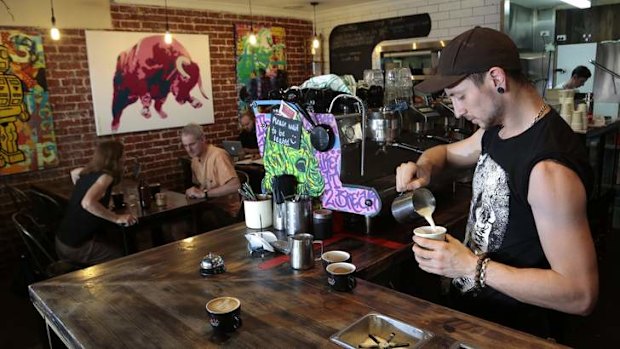 Ona Coffee Manuka barista Dan Cullen at work.