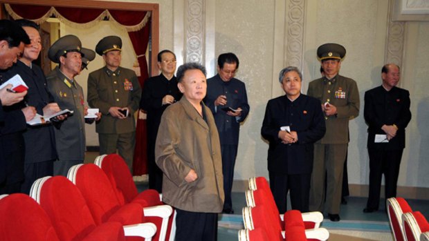 This undated picture, released from North Korea's official Korean Central News Agency on April 5, 2009 shows North Korean leader Kim Jong Il (centre) inspecting the renovated Pyongyang Grand Theatre in Pyongyang.