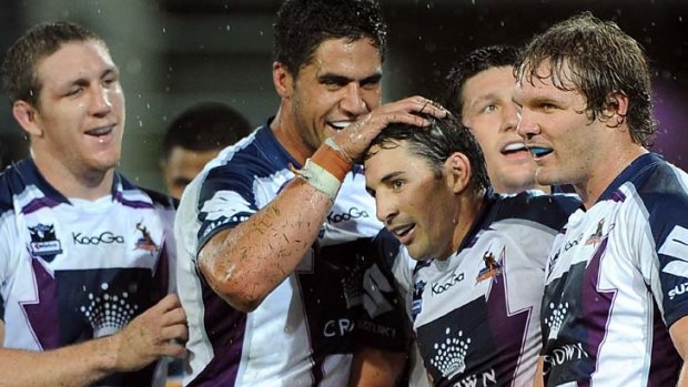 Dazzling display &#8230; Melbourne Storm players congratulate Billy Slater last night.