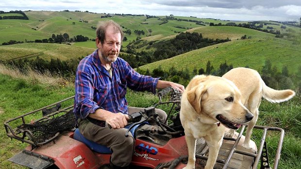Feeling undermined: Phil Piper, and dog Floss, on land that could become a coalmine.