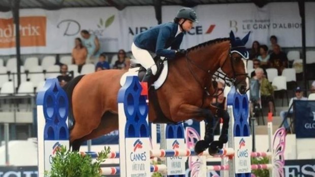 Kristy Clark showjumping in France.