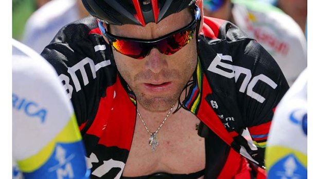 Determined: Cadel Evans rides in the pack during the 20th stage of the 100th Tour de France.