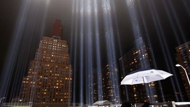 Rays of hope ... workers fine-tune the Tribute in Lights which will beam 88 searchlights into the sky close to the World Trade Centre.
