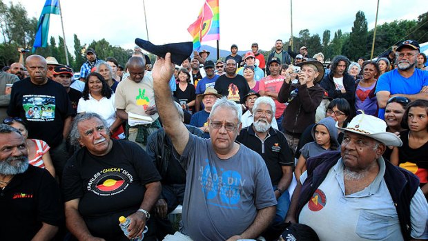 No stranger to controversy ... Paul Coe holds up Julia Gillard's shoe at the Aboriginal Tent Embassy in Canberra after she lost it during yesterday's protest.