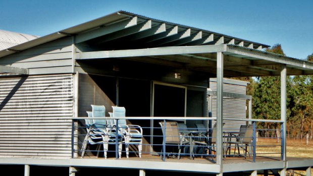 IronBark Hill Lodge sleeps 15 people and includes use of a swimming pool and tennis court.