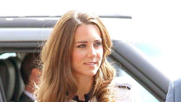 Royal navy blue ... Kate Middleton makes a virtue of the vice-regal look.