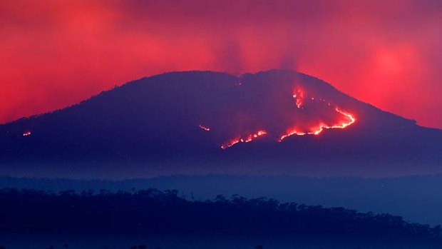 Ash either way: Fire raging on Mount Banks in the Blue Mountains on Thursday resembles a lava flow.