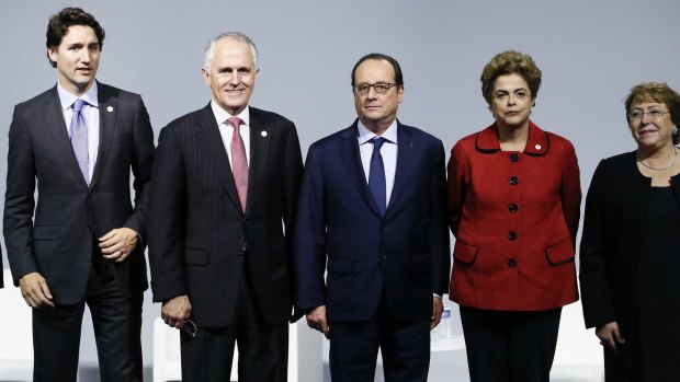 From left, Canada's Prime Minister Justin Trudeau, Australian Prime Minister Malcolm Turnbull, French President Francois Hollande, Brazil's President Dilma Roussef, and Chilean President Michelle Bachelet attend the Mission Innovation: Accelerating the Clean Energy Revolution meeting at the COP2, United Nations Climate Change Conference, in Le Bourget, north of Paris, on November 30.