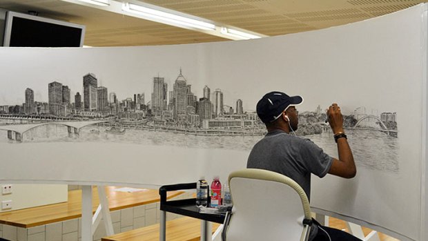 Stephen Wiltshire puts the finishing touches on his sketch of the Brisbane CBD.