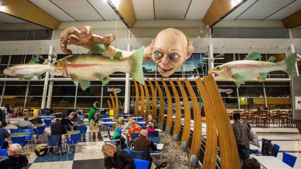 The 13-metre sculpture of  Gollum looms over passengers at Wellington Airport.
