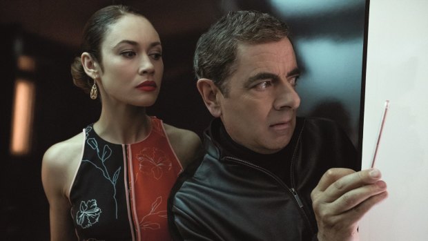 Olga Kurylenko as Ophelia and Rowan Atkinson as Johnny English.