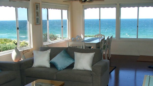 Beachfront bliss ... the Beach House's open-plan living areas with ocean views.
