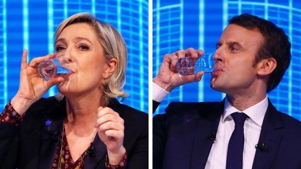 Marine Le Pen and Emmanuel Macron during the Re-invest France, the first of three televised debates before presidential elections next month.