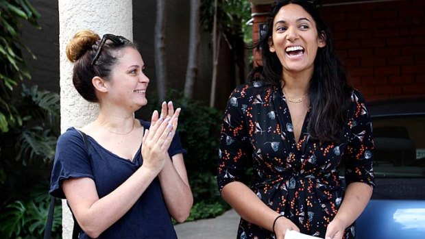 Buyer's joy: Successful Newtown bidder Shehana Wijesena, right, is congratulated by her sister-in-law Blair Wijesena.