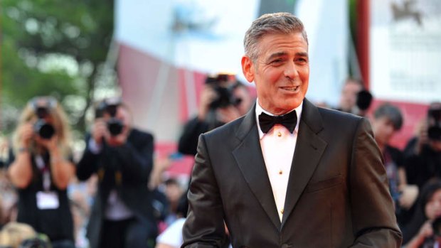 Funny man:  George Clooney at the opening ceremony of the 70th Venice Film Festival and the screening of <i>Gravity</i>, which he stars in with Sandra Bullcok.