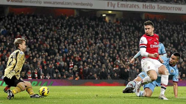 Arsenal striker Olivier Giroud scores his second and Arsenal's fifth goal.