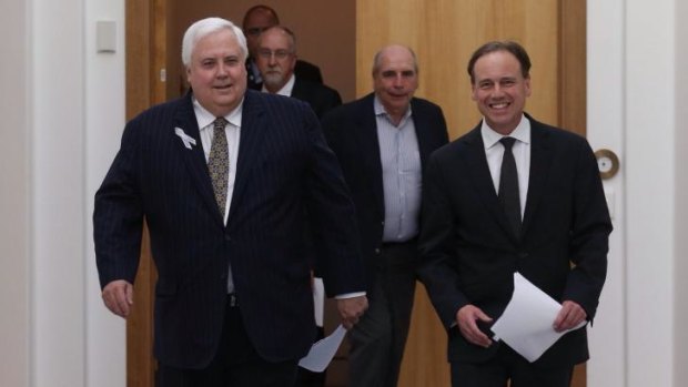 Better than nothing: Deal between PUP leader Clive Palmer and Environment Minister Greg Hunt.