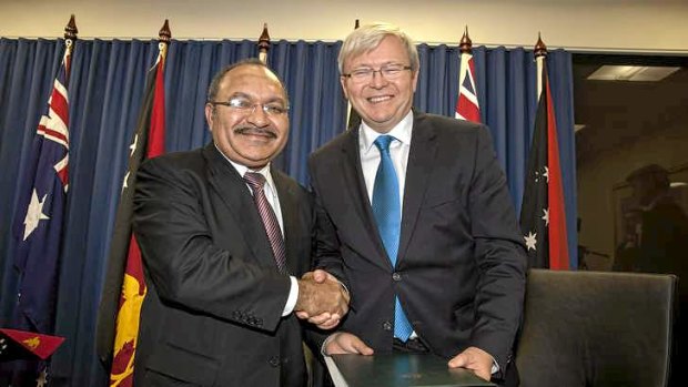 Done deal: PNG PM Peter O'Neill and Kevin Rudd.