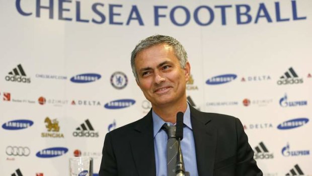 Together again: Newly reappointed Chelsea manager Jose Mourinho meets the media at Stamford Bridge. The event attracted more than 250 journalists.