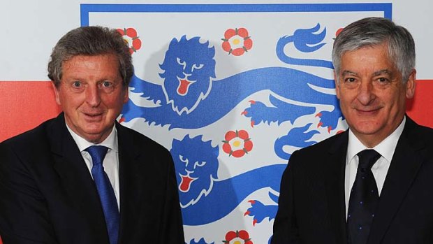 New England manager Roy Hodgson poses with FA Chairman David Bernstein after a press conference at Wembley Stadium on Tuesday.