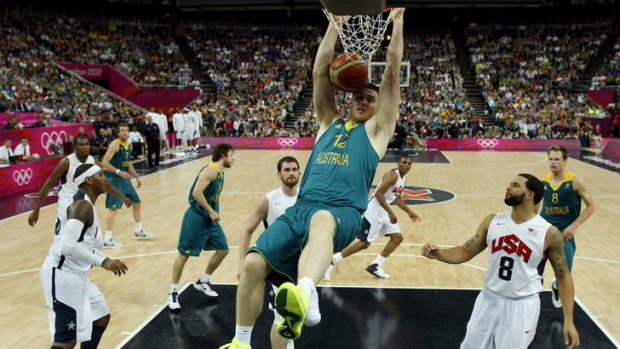 Size in the paint: Aron Baynes dunks against the US at the London Olympics.