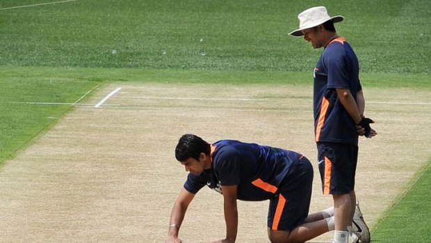 Hands on &#8230; India's Sachin Tendulkar, right, and Zaheer Khan inspect the MCG wicket yesterday ahead of today's Boxing Day Test.