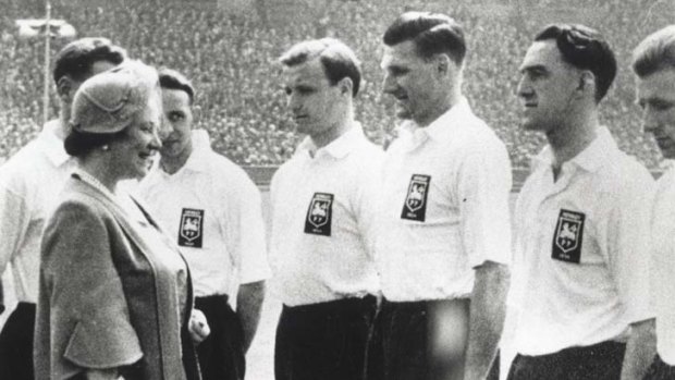 Joe Marston, third from right, and teammates are presented to the Queen Mother before the 1954 FA Cup.