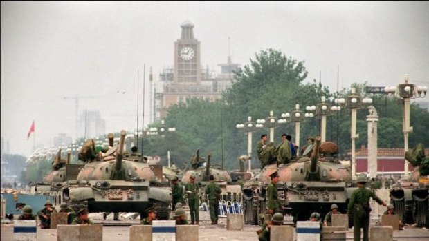 This file photo taken on June 6, 1989 shows the People's Liberation Army  tanks guarding the strategic Chang'an Avenue leading to Tiananmen Square in Beijing. 