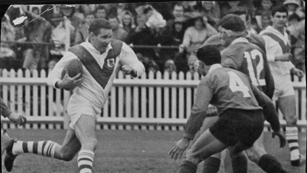 Graeme Langlands braces himself as he makes from full-back on September 9, 1967.