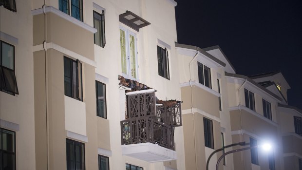 The fourth floor balcony rests on the balcony below after collapsing in Berkeley, California.