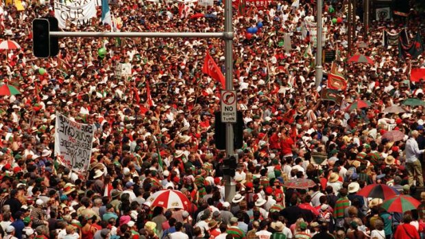 Spirited showing ... an estimated 80,000 supporters marched down George Street to protest the expulsion of the Rabbitohs from the NRL.