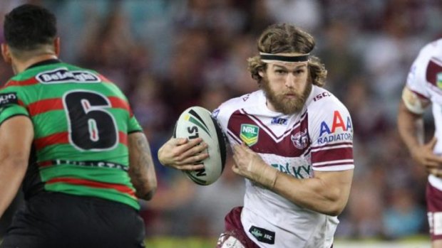 Manly's David Williams (right) has been banned for betting on NRL matches.