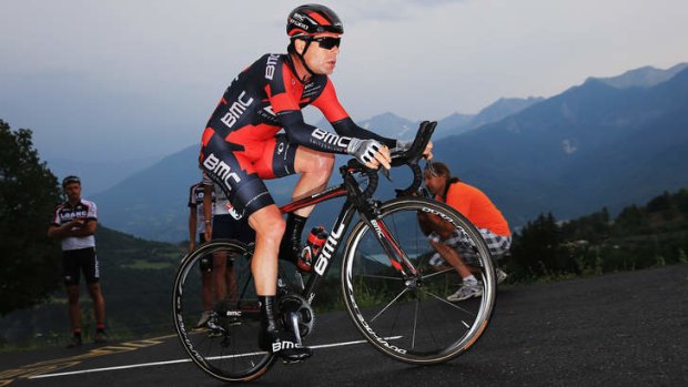 Uphill battle: Cadel Evans works hard in the time trial on stage 17.