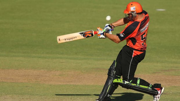 Craig Simmons of the Scorchers hits out during the Big Bash League.