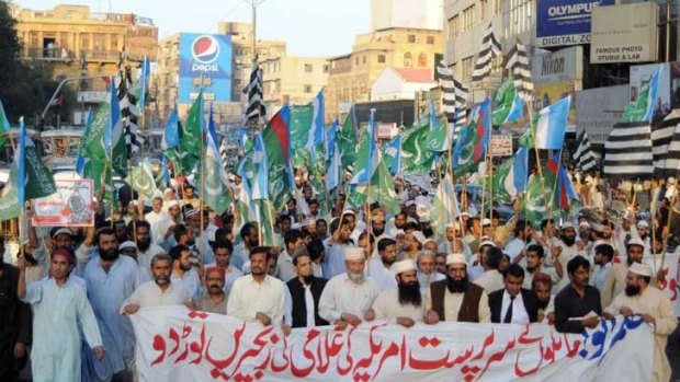 Activists from Pakistani Islamist party Jamaat-i-Islam protest against the release of CIA contractor Raymond Davis in Karachi.