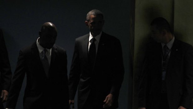 Barack Obama arrives to speak at the Millennium Development Goals Summit at the UN.