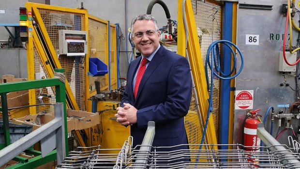 Out for the count: Shadow Treasurer Joe Hockey at a manufacturing facility in Adelaide this week.