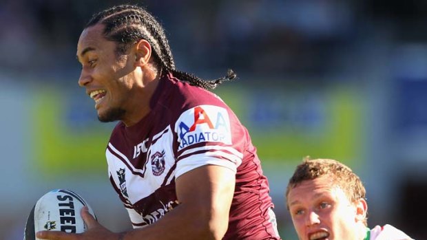 Staying put &#8230; Steve Matai tries to pull away during Sunday's clash with the Raiders, but he's not pulling away from Manly.