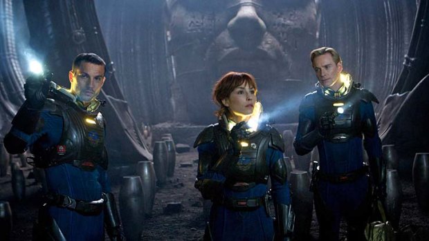 Logan Marshall-Green, left, Noomi Rapace, and Michael Fassbender, right, in "Prometheus."