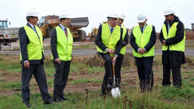 Queanbeyan mayor, Tim Overall, newly appointed first principal, Ian Hewitt, board chair Graham Willard, Bishop Stuart Robinson, Member for Monaro John Barilaro and Ngunnawal elder Tyrone Bell during the sod-turning ceremony.
