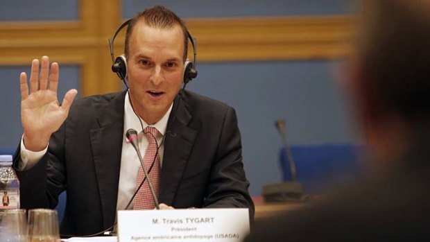 The head of  USADA, Travis Tygart, takes an oath prior to answering questions before a senate-led inquiry into the fight against doping.