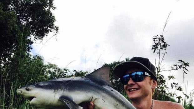 Jamie Leeder with a bull shark caught earlier this year, one of the many he and Jarrad Smith have caught.