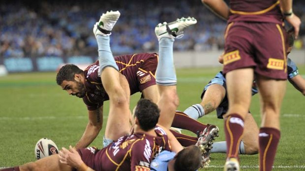 Contentious ... Greg Inglis's try was shrouded in controversy.