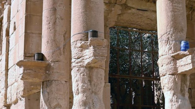 Islamic State militants in Palmyra placed explosives on the ancient temple's columns.