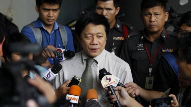 Commander of the Institute of Forensic Medicine Pornchai Suteerakune addresses reporters at the Police Forensic Department, where the bodies of two British tourists killed on Koh Tao island were brought a day before.