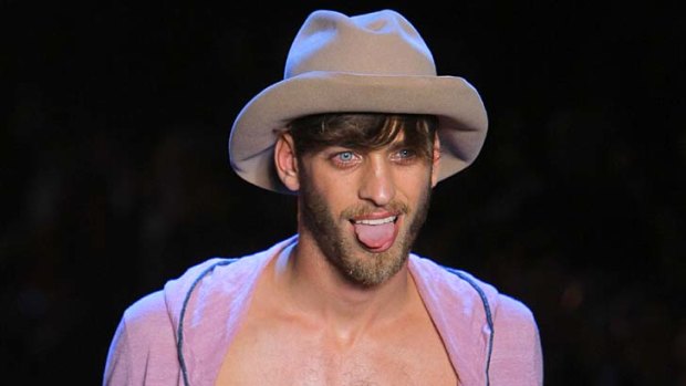 A model wears a creation by Bill Gaytten for John Galliano collection as part of spring-summer 2012 men's fashion in Paris.
