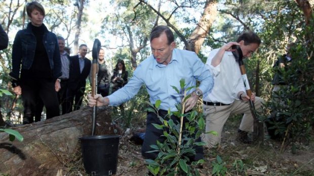 Prime Minister Tony Abbott, accompanied by his wife Margie Abbott, holds a joint press conference with minister for the environment Greg Hunt at Carss Bush Park.