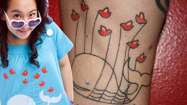 Sydney designer Yiying Lu wearing a fail whale t-shirt and a fan's tattoo.