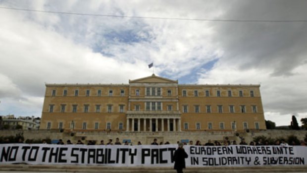 Protesters in Athens this month. Greece owes $US300-400 billion.