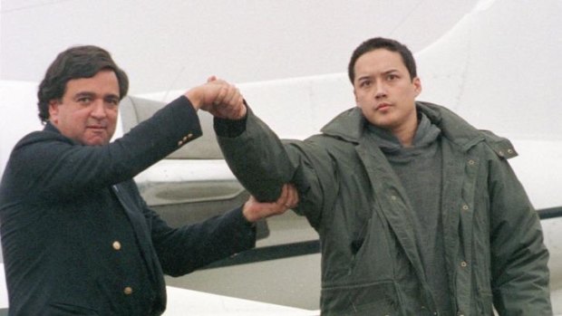 Evan Hunziker, right, shakes hands with then-US Representative  Bill Richardson after being freed from North Korea in 1996. Hunziker decided to visit after a reported bout of drinking.